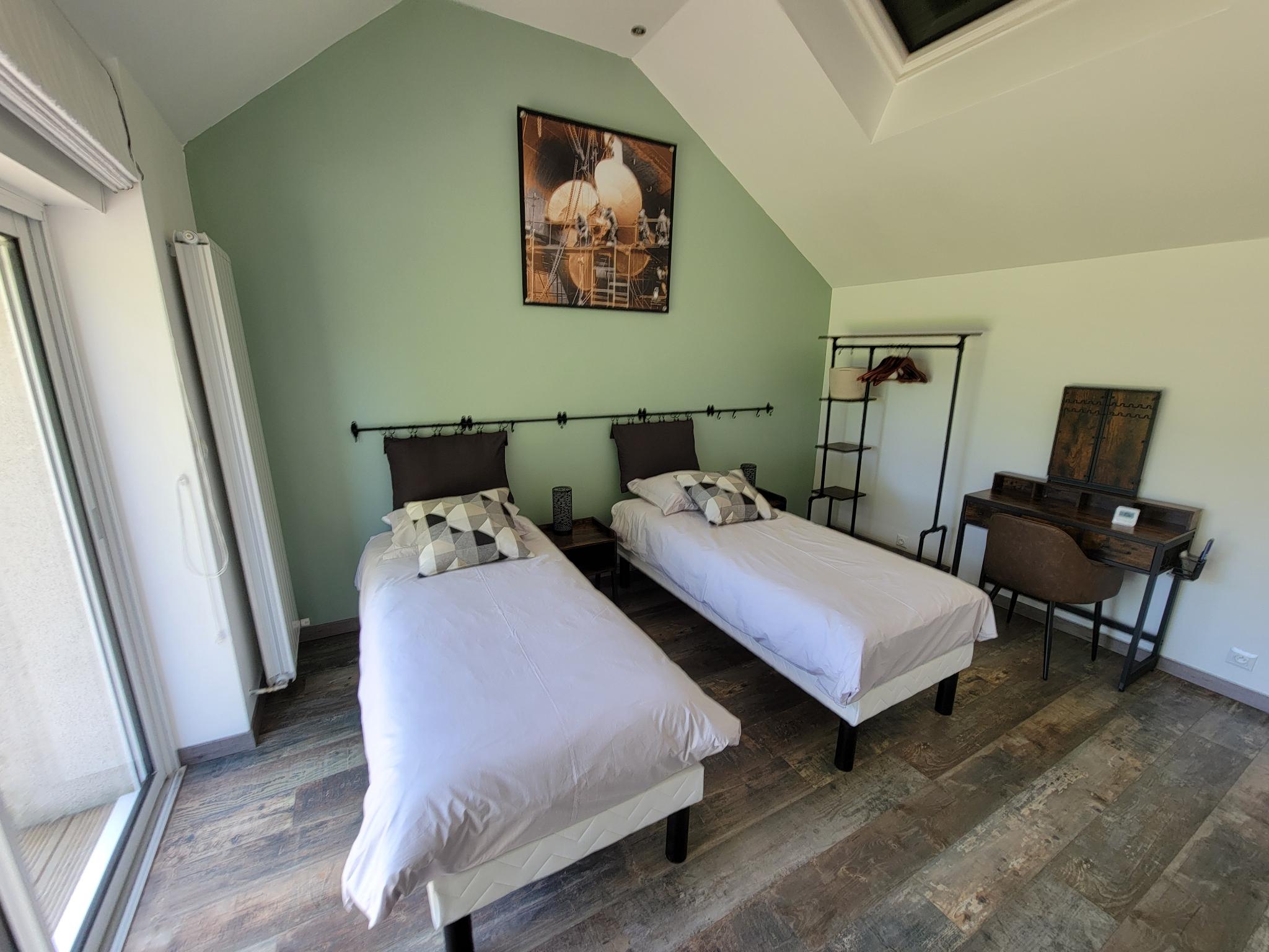 Chambre Rétro – lits jumeaux